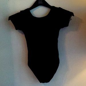 Kids black leotard good condition size 12/14 large